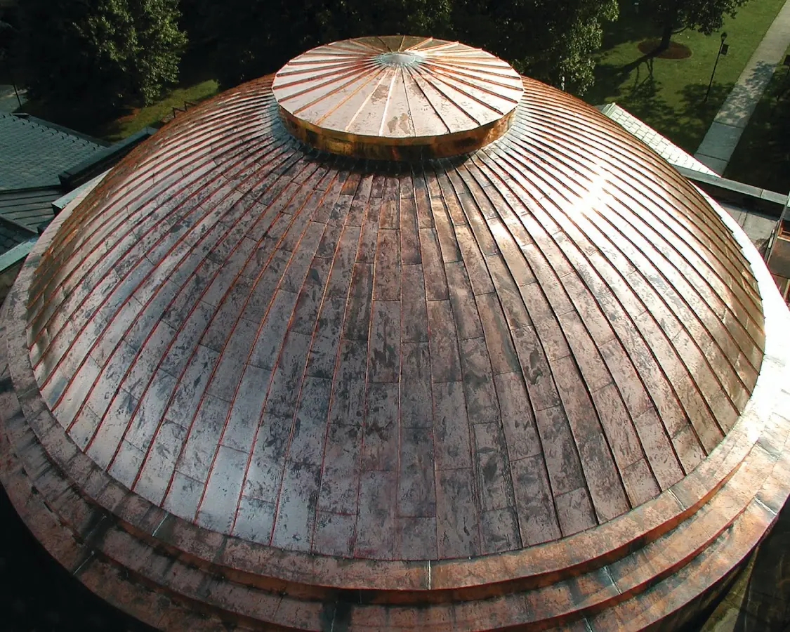 Craftsman Roofing crew installing a new roof in North Central